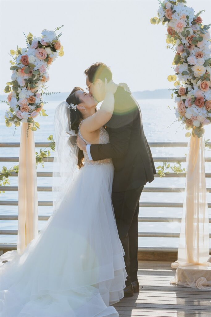 Wedding Ceremony Kiss at Ray's Boathouse Seattle Wedding Venue